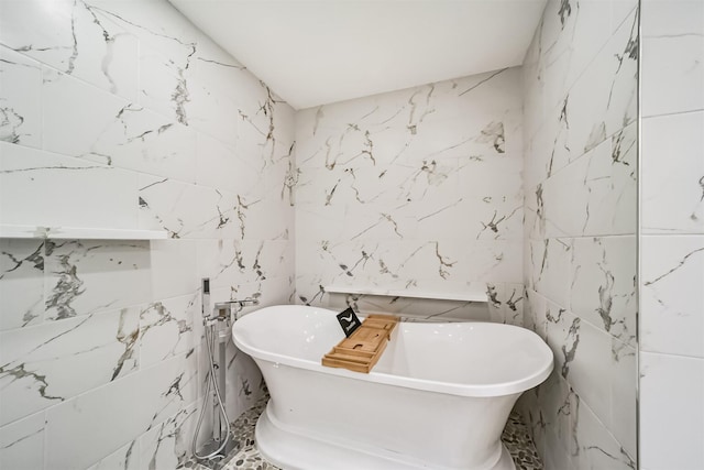 2742 Triway Ln, Houston, TX 77043 - bathroom with a soaking tub and tile walls
