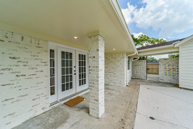 2742 Triway Ln, Houston, TX 77043 - view of patio / terrace with fence, french doors, and a gate
