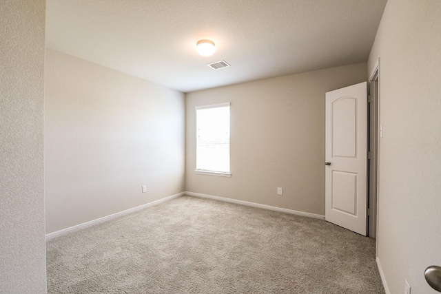 2103 Islawild Way, Texas City, TX 77568 - carpeted empty room featuring baseboards