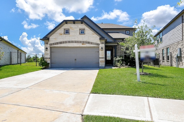 2103 Islawild Way, Texas City, TX 77568 - french country style house featuring stone siding and driveway