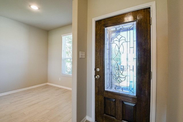 2103 Islawild Way, Texas City, TX 77568 - entryway with light wood-type flooring, baseboards, and recessed lighting