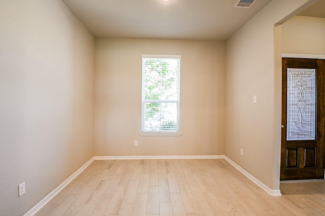 2103 Islawild Way, Texas City, TX 77568 - empty room with light wood-style flooring and baseboards