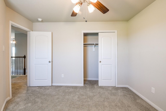 2103 Islawild Way, Texas City, TX 77568 - unfurnished bedroom featuring carpet floors, a closet, baseboards, and ceiling fan