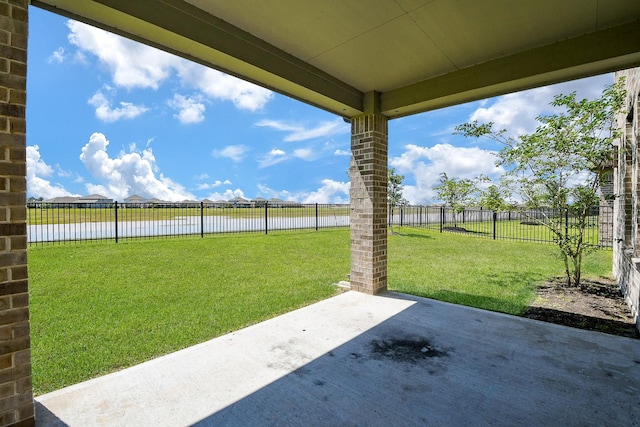 2103 Islawild Way, Texas City, TX 77568 - view of yard with a water view and a patio area