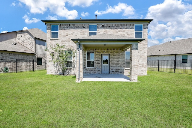 2103 Islawild Way, Texas City, TX 77568 - rear view of house featuring brick siding and a patio
