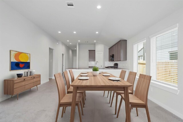 369 Spruce Oak Ln, Waller, TX 77484 - dining room with baseboards, light carpet, recessed lighting, and vaulted ceiling