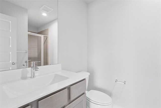 369 Spruce Oak Ln, Waller, TX 77484 - full bath with toilet, tiled shower, vanity, baseboards, and recessed lighting
