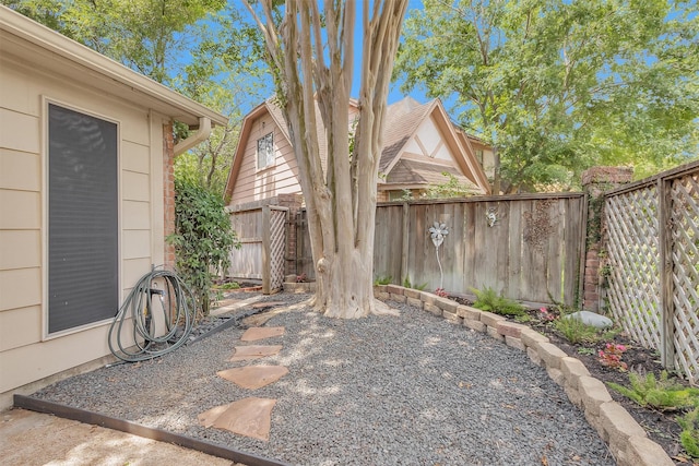 view of patio featuring fence