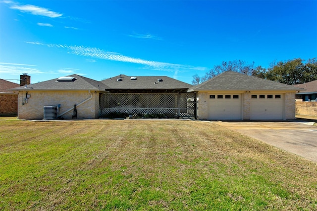 ranch-style house with brick siding, roof with shingles, central AC, and a front lawn