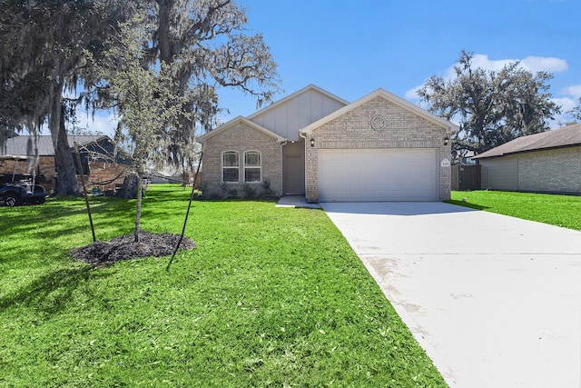 ranch-style home featuring a garage, brick siding, a front lawn, and driveway
