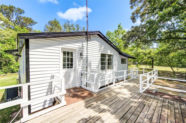 wooden deck featuring central AC