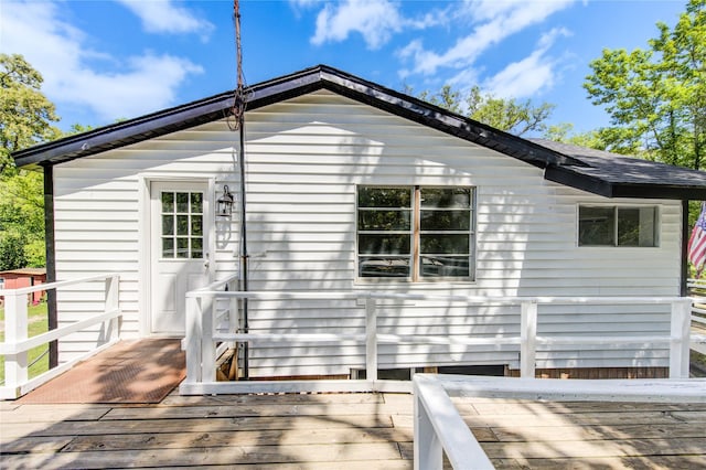 rear view of property with a deck