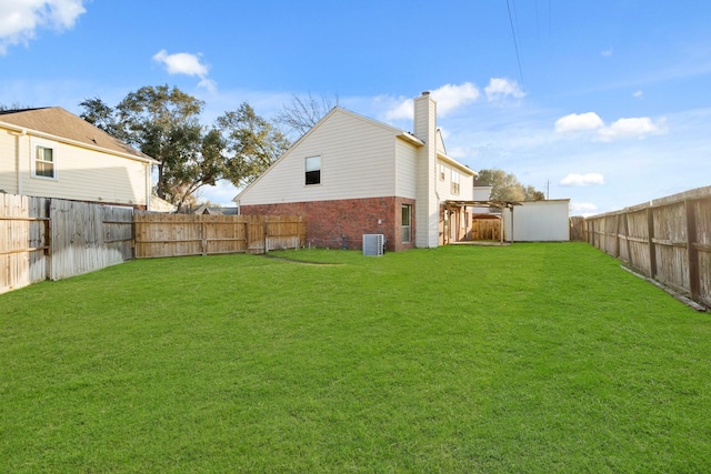 view of yard featuring cooling unit and a fenced backyard