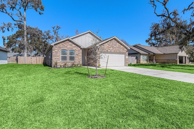 ranch-style home with concrete driveway, fence, a front yard, and a garage