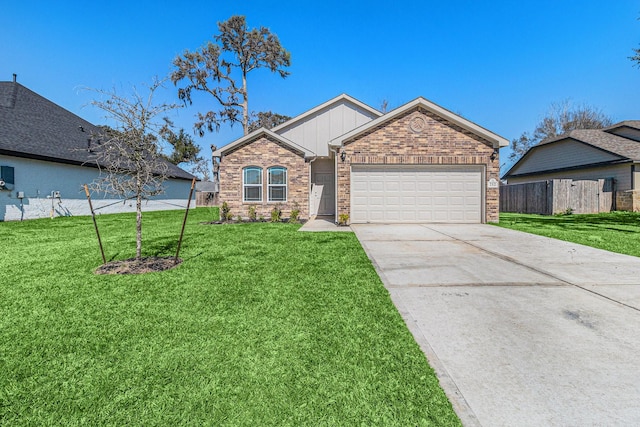 ranch-style home with driveway, a front yard, and a garage