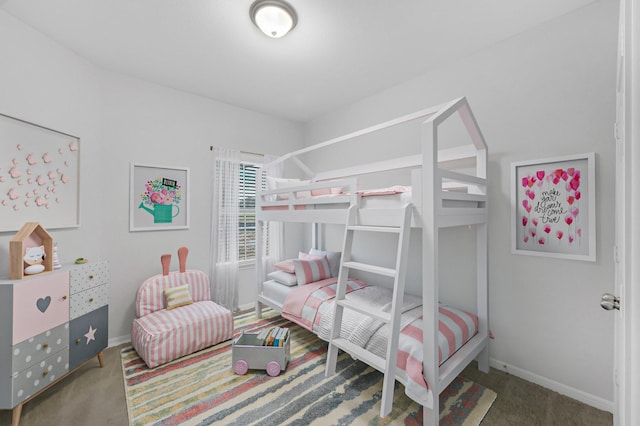 24709 Stablewood Forest Ct, Huffman, TX 77336 - carpeted bedroom featuring baseboards