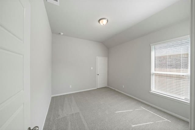 5319 Costa Ridge Ln, Katy, TX 77493 - carpeted spare room featuring lofted ceiling and baseboards