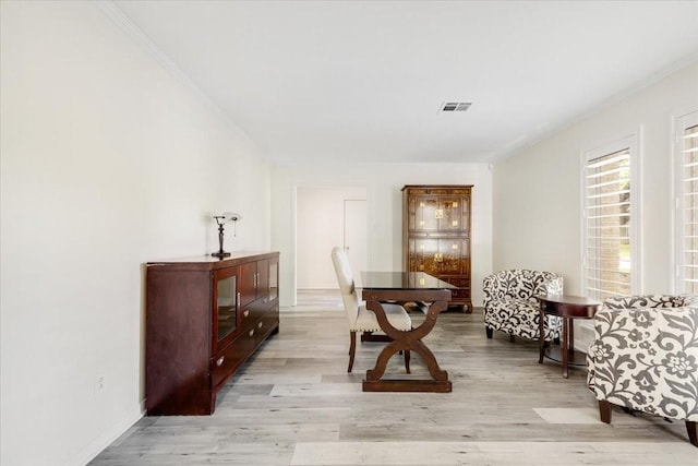 1330 Saxony Ln, Houston, TX 77058 - sitting room with baseboards, crown molding, light wood-style floors, and visible vents