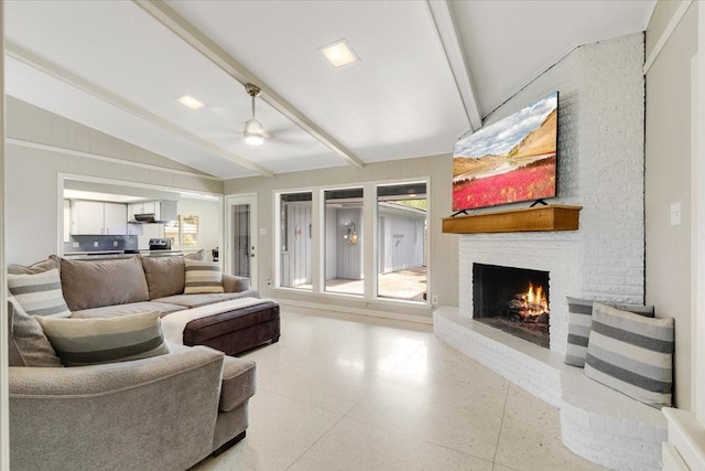 1330 Saxony Ln, Houston, TX 77058 - living room with lofted ceiling with beams, light speckled floor, a ceiling fan, and a fireplace