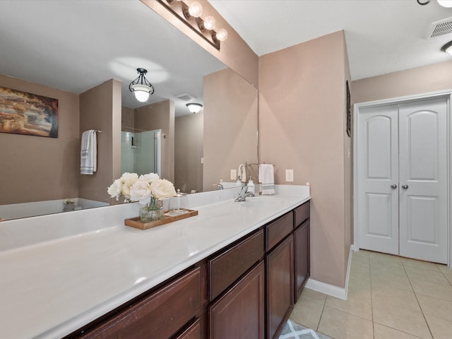 20819 Mount Bauer Dr, Hockley, TX 77447 - full bath featuring a stall shower, visible vents, baseboards, tile patterned flooring, and vanity