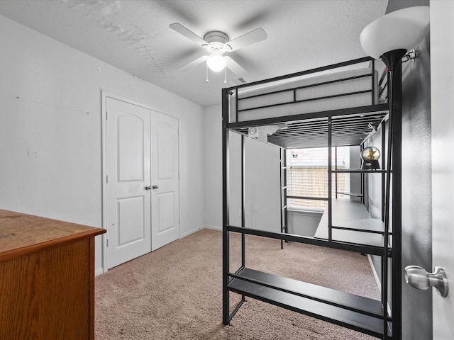 20819 Mount Bauer Dr, Hockley, TX 77447 - unfurnished bedroom featuring carpet floors, a closet, and ceiling fan