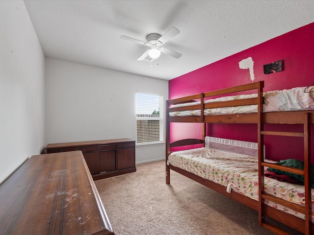 20819 Mount Bauer Dr, Hockley, TX 77447 - carpeted bedroom with a ceiling fan and a textured ceiling