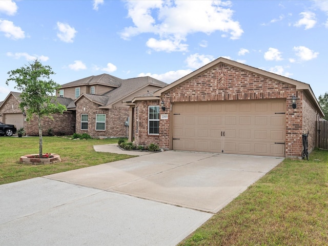 20819 Mount Bauer Dr, Hockley, TX 77447 - view of front of house with brick siding, an attached garage, a front yard, and concrete driveway