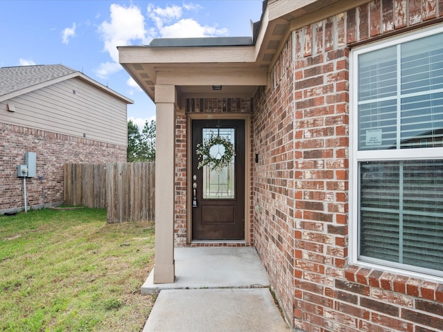 20819 Mount Bauer Dr, Hockley, TX 77447 - entrance to property featuring fence, brick siding, and a yard