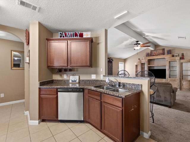 20819 Mount Bauer Dr, Hockley, TX 77447 - kitchen featuring dishwasher, visible vents, a ceiling fan, a sink, and a peninsula