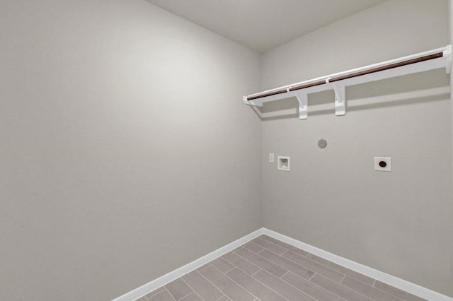 26400 Cooperstown Way, Splendora, TX 77372 - laundry room featuring electric dryer hookup, laundry area, baseboards, hookup for a gas dryer, and washer hookup