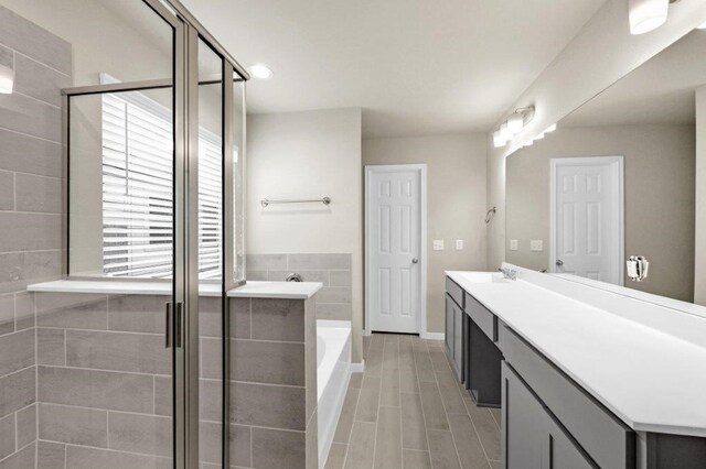 26400 Cooperstown Way, Splendora, TX 77372 - bathroom with baseboards, a garden tub, vanity, and a stall shower