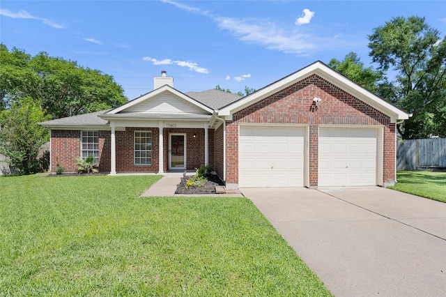 17402 Eastwood Cir, Houston, TX 77095 - view of front facade with driveway, a garage, a chimney, and brick siding