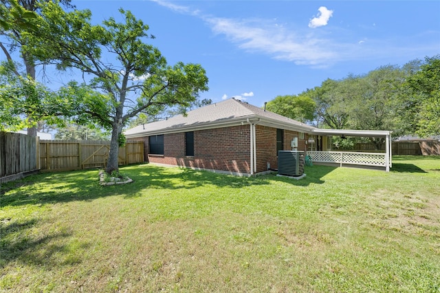 17402 Eastwood Cir, Houston, TX 77095 - view of side of property with brick siding, central AC unit, and roof with shingles