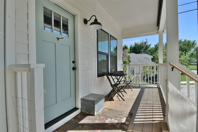 entrance to property with a porch