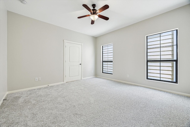 5308 Larkin St Unit B, Houston, TX 77007 - empty room featuring carpet floors, a ceiling fan, and baseboards