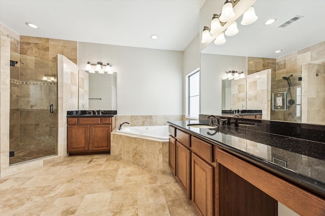 5308 Larkin St Unit B, Houston, TX 77007 - full bath with a shower stall, a garden tub, a sink, two vanities, and visible vents