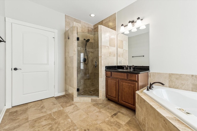 5308 Larkin St Unit B, Houston, TX 77007 - full bathroom featuring baseboards, a garden tub, vanity, and tiled shower