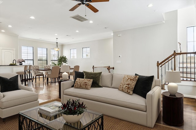 5308 Larkin St Unit B, Houston, TX 77007 - living room with visible vents, recessed lighting, a ceiling fan, wood finished floors, and crown molding