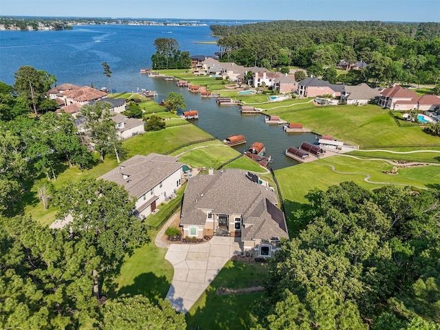 18762 Grand Harbor Pt, Montgomery, TX 77356 - aerial perspective of suburban area with a nearby body of water