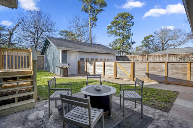 2407 Stonecrest Dr, Houston, TX 77018 - view of patio / terrace featuring a fenced backyard, a fire pit, and grilling area