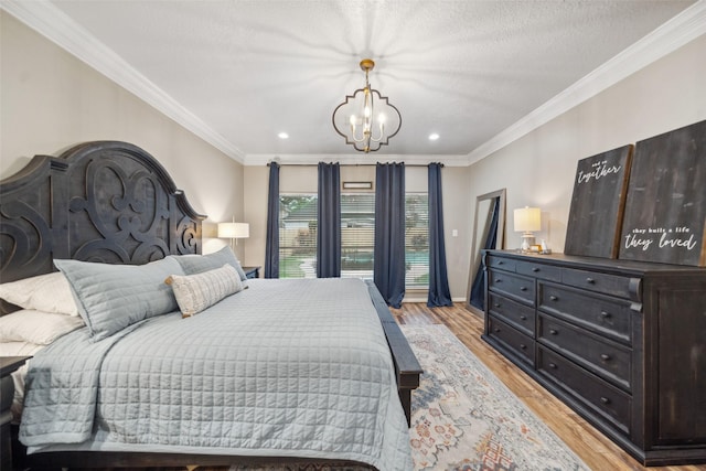 bedroom with light wood finished floors, baseboards, an inviting chandelier, recessed lighting, and ornamental molding