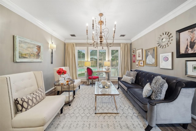 living room with visible vents, wood finished floors, a chandelier, and crown molding