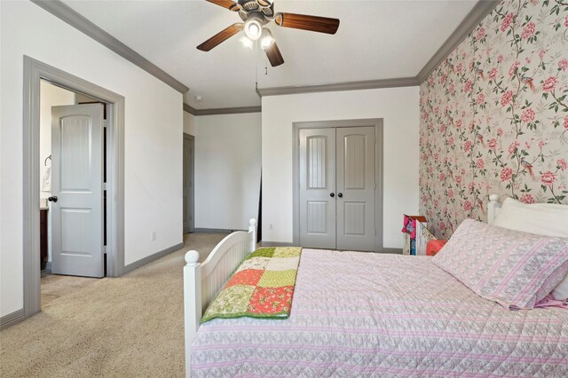 2419 Briarhurst Dr, Houston, TX 77057 - carpeted bedroom featuring ornamental molding, a closet, and ceiling fan