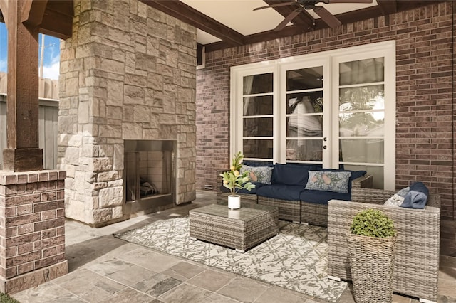 2419 Briarhurst Dr, Houston, TX 77057 - view of patio featuring ceiling fan and an outdoor living space with a fireplace