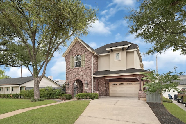 2419 Briarhurst Dr, Houston, TX 77057 - traditional home with driveway, a front lawn, a garage, brick siding, and stucco siding
