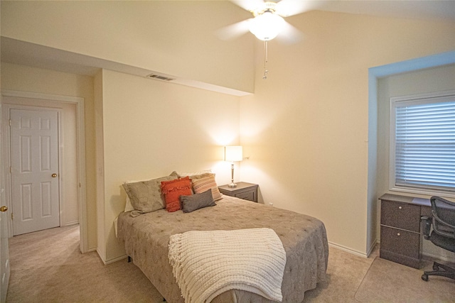bedroom with light colored carpet, ceiling fan, baseboards, and visible vents