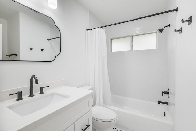 bathroom featuring vanity, shower / bath combo, and toilet
