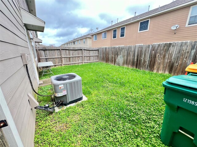 6022 Yorkglen Manor Ln, Houston, TX 77084 - view of yard featuring central air condition unit