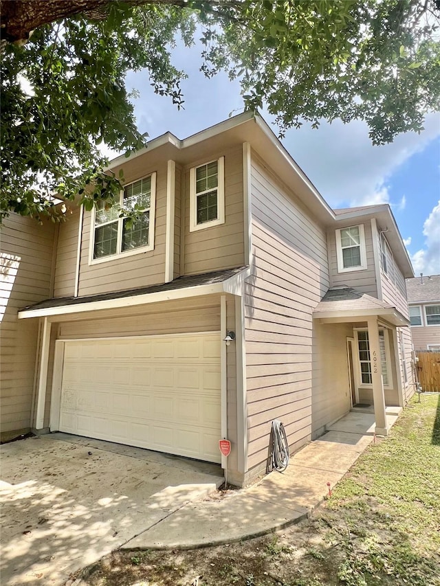 6022 Yorkglen Manor Ln, Houston, TX 77084 - view of home's exterior with an attached garage and driveway