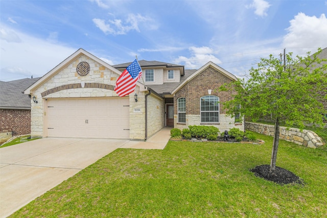 view of front of property with stone siding, an attached garage, driveway, and a front yard